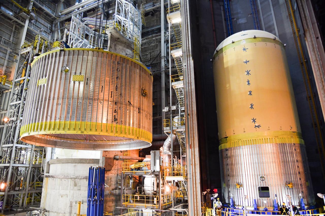 The Space Launch System (SLS) rocket’s liquid oxygen tank structural test article was manufactured and stacked in June 2019 at NASA’s Michoud Assembly Facility in New Orleans. To construct the test article, Boeing technicians at Michoud moved the liquid oxygen tank to the Vertical Assemby Building stacking and integration area. Here, they added simulators to mimic the two structures that connect to the tank, the intertank and the forward skirt.  This structural hardware for the SLS core stage for America’s new deep space rocket is structurally identical to the flight version of the tank. It will be shipped on the Pegasus barge to NASA’s Marshall Space Flight Center in Hunstville, Alabama, where it will undergo a series of tests that simulate the stresses and loads of liftoff and flight. These tests will help ensure designs are adequate for successful SLS missions to the Moon and beyond. The flight liquid oxygen tank along with the liquid hydrogen tank supplies more than 500,000 gallons of propellant to the core stages four RS-25 engines, which produce 2 million pounds of thrust to help send the SLS rocket to space.